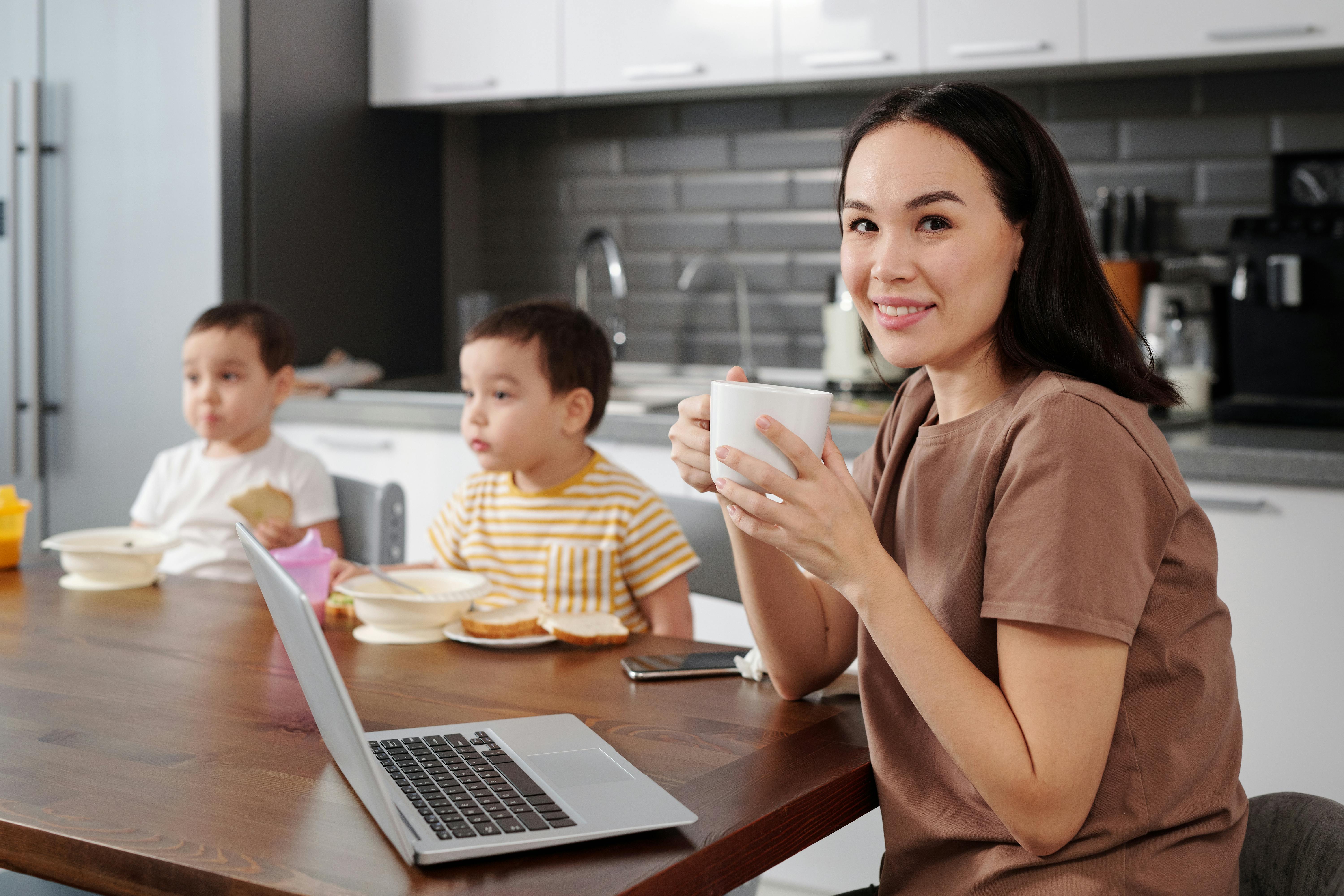 Grace — AI Moms Graduate working from home with her kids